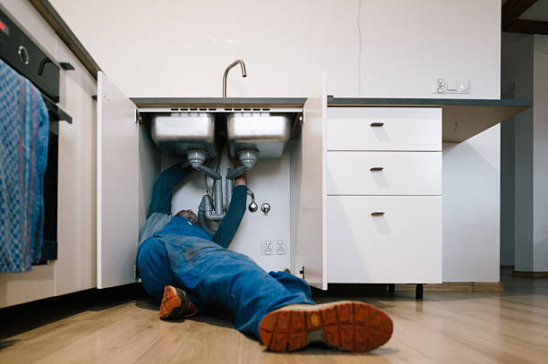 Professional Drain Cleaning technician working in Grand Blanc, MI